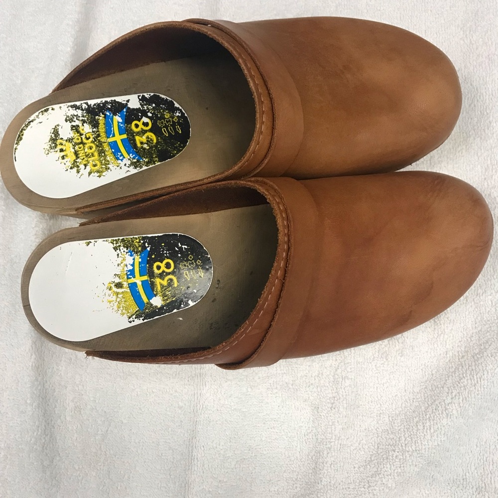 Brown leather clogs